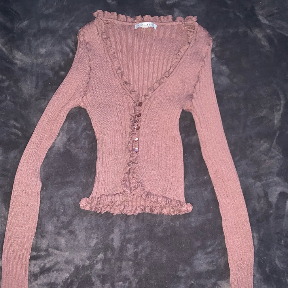 super cute , very soft material ! it looks smaller than it is